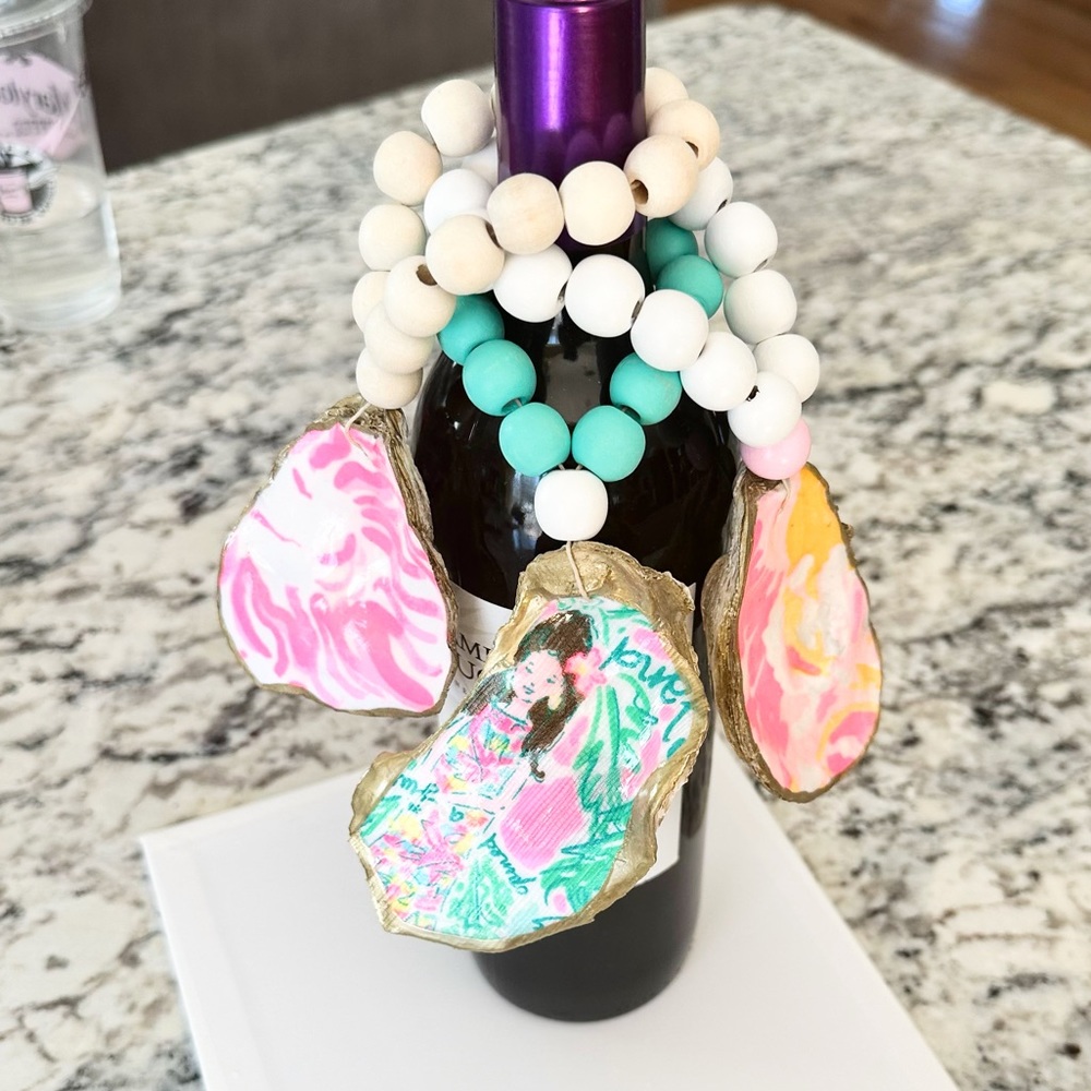 Lily inspired oyster shell trinket tag